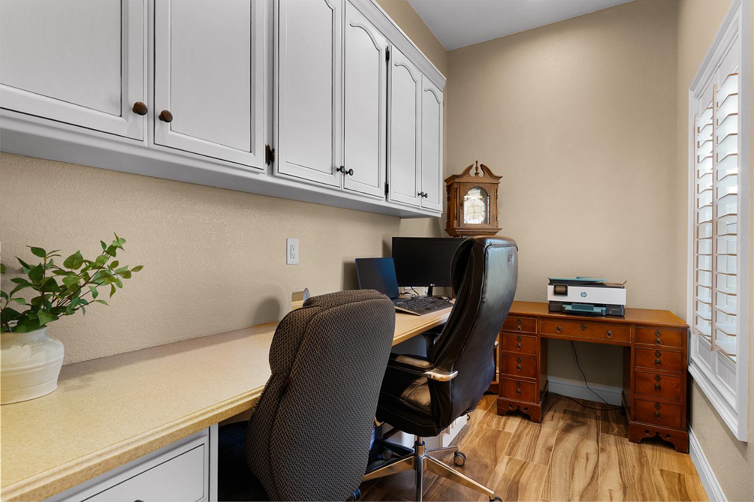 8300 Auburn Folsom Road Granite Bay, CA 95746 - Photo 22 of 45 a workspace with furniture and wooden floor