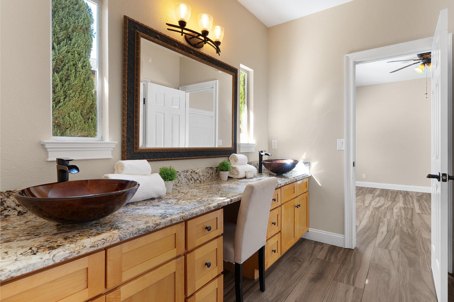 8300 Auburn Folsom Road Granite Bay, CA 95746 - Photo 30 of 45 a bathroom with sink granite and mirror