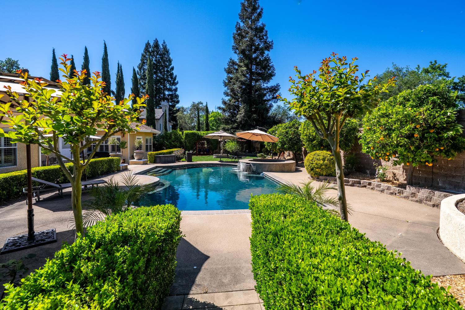 8300 Auburn Folsom Road Granite Bay, CA 95746 - Photo 40 of 45 a view of a swimming pool with a patio