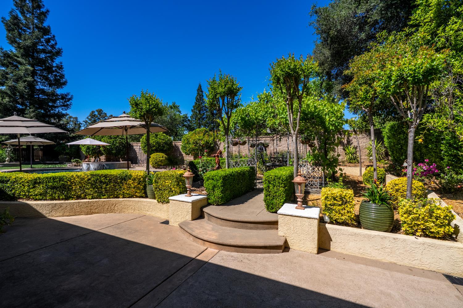 8300 Auburn Folsom Road Granite Bay, CA 95746 - Photo 42 of 45 a view of a street with a bench and some trees