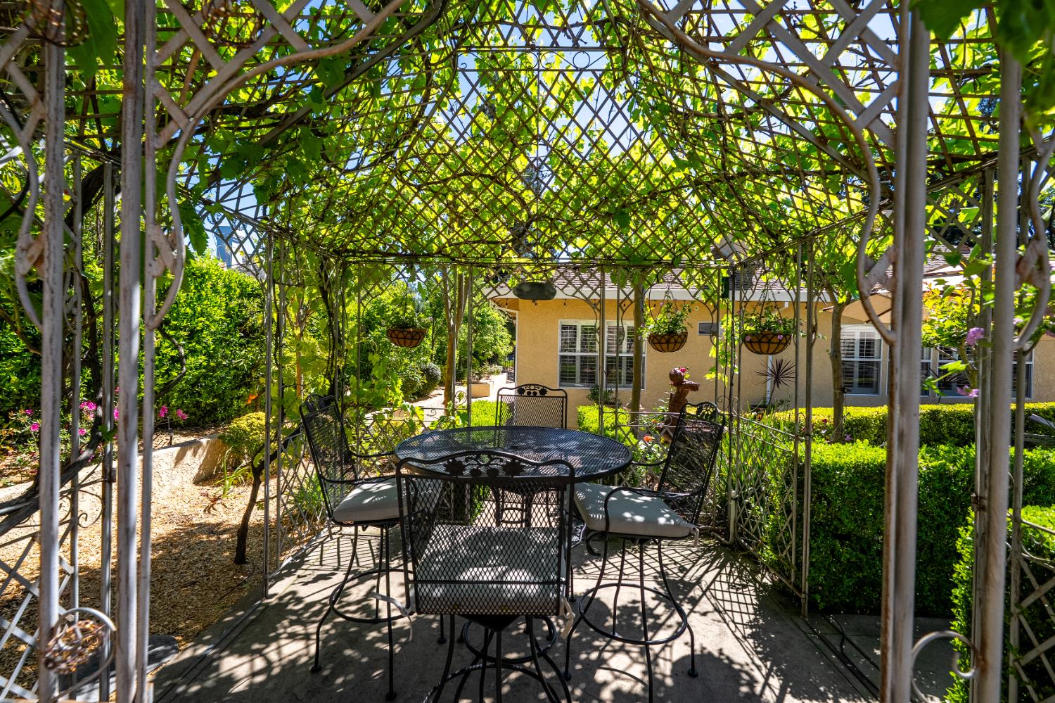 8300 Auburn Folsom Road Granite Bay, CA 95746 - Photo 45 of 45 a view of a patio with table and chairs and potted plants