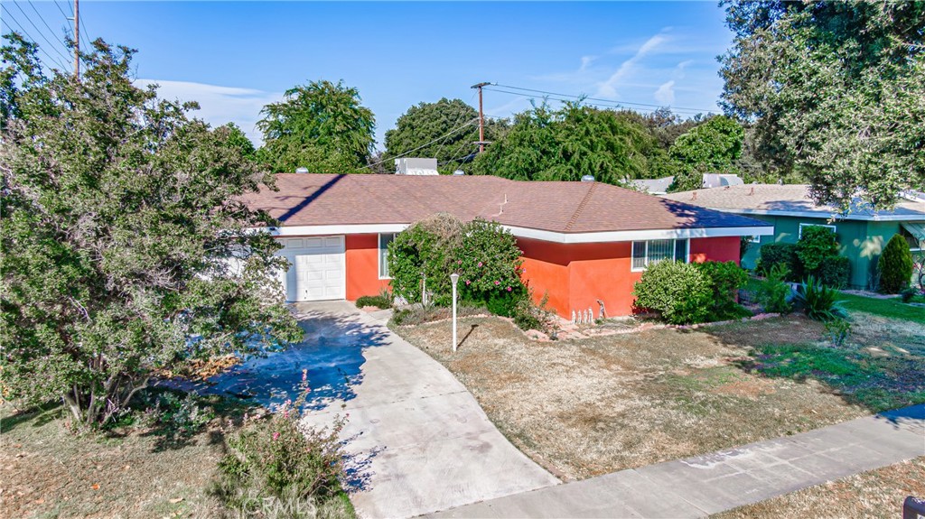 4193 Overland Street Riverside, CA 92503 - Photo 1 of 1 a view of a house with a yard and street