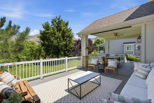 1263 East 1200th South Springville, UT 84663 - Photo 45 of 60 Spacious covered deck featuring composite decking, white railing, and a ceiling fan