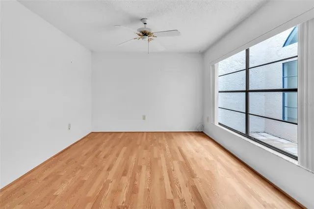 a view of a house with backyard and porch