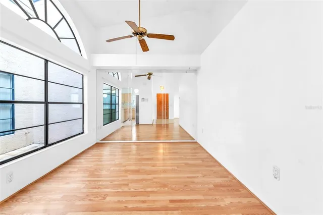 a kitchen with stainless steel appliances a sink a stove a microwave a sink and cabinets