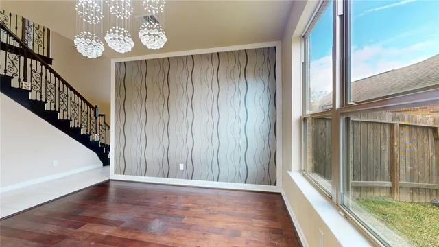 a large kitchen with a large window