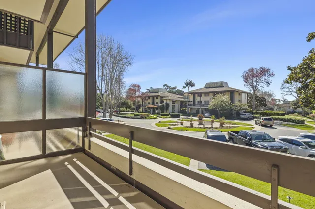 a view of swimming pool from a balcony