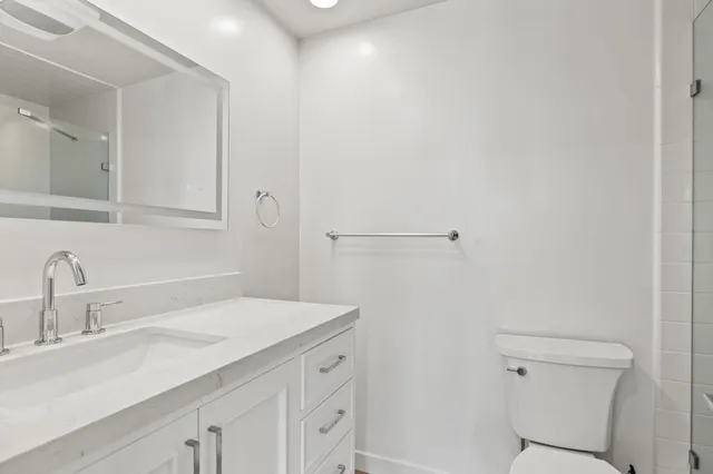 a bathroom with a sink and a toilet