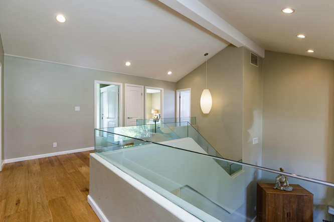 1330 Beachmont Street Ventura, CA 93001 - Photo 16 of 35 a view of a room with a chandelier and wooden floor