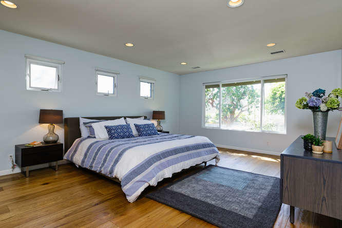 1330 Beachmont Street Ventura, CA 93001 - Photo 17 of 35 a spacious bedroom with a bed and a window