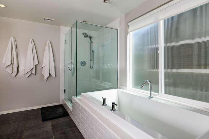 1330 Beachmont Street Ventura, CA 93001 - Photo 19 of 35 a bathroom with a tub and a shower