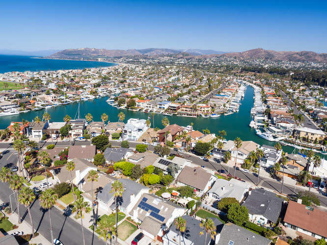 1330 Beachmont Street Ventura, CA 93001 - Photo 30 of 35 an aerial view of a city with lots of residential buildings ocean and mountain view in back