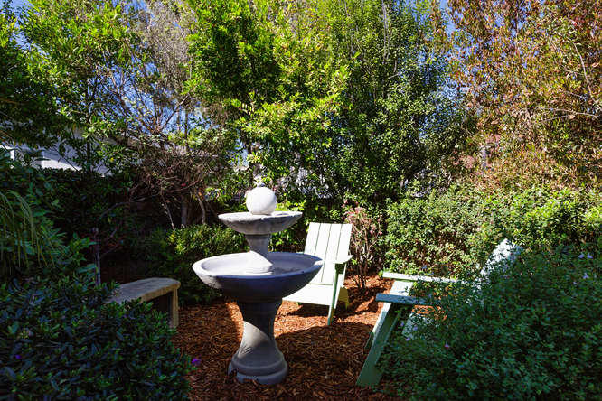 1330 Beachmont Street Ventura, CA 93001 - Photo 3 of 35 a view of a backyard with sitting area and garden