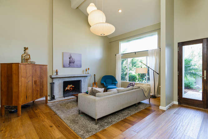 1330 Beachmont Street Ventura, CA 93001 - Photo 4 of 35 a living room with furniture and a fireplace