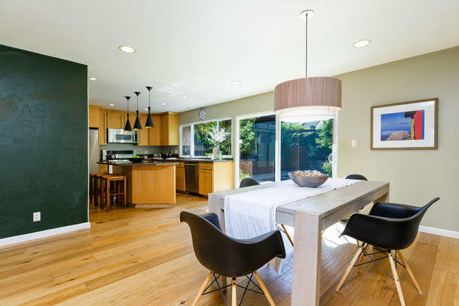 1330 Beachmont Street Ventura, CA 93001 - Photo 7 of 35 a view of a dining room with furniture a chandelier and wooden floor