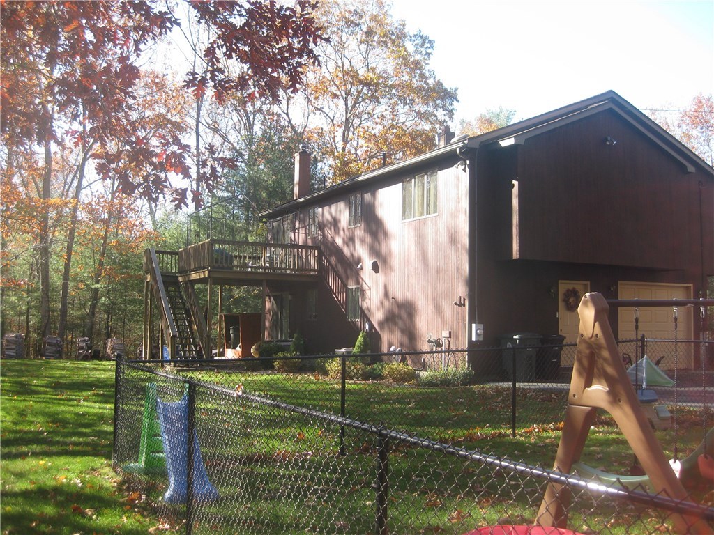 752 Hammet Road Coventry, RI 02816 - Photo 4 of 22 private back yard with a fenced in area