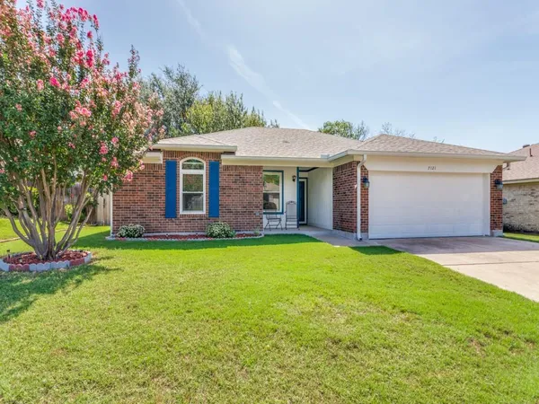 a backyard of a house with seating space