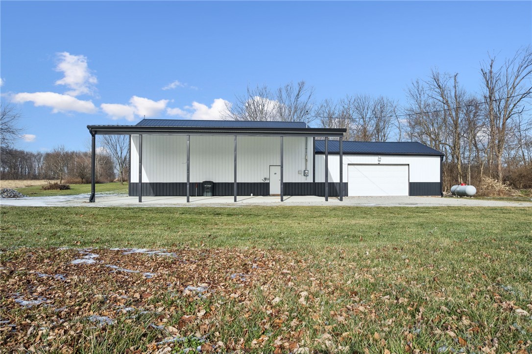 1602 Westboro Road Blanchester, OH 45107 - Photo 45 of 81 This newly constructed structure offers ample garage space and a versatile covered area.