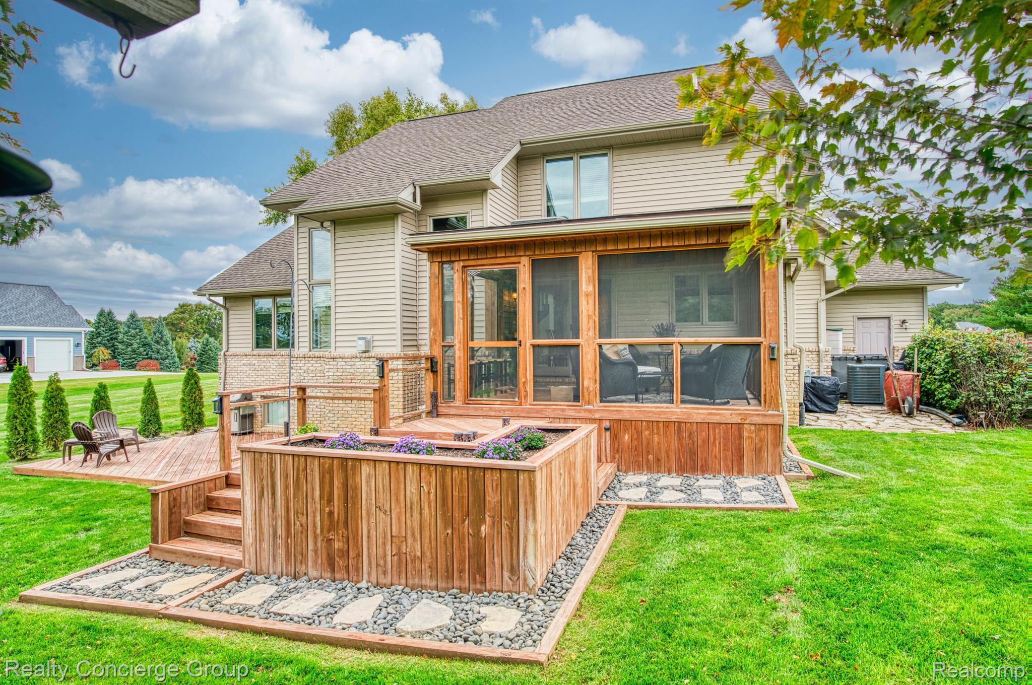 1172 Thorn Ridge Drive Howell, MI 48843 - Photo 53 of 71 Raised deck offers seating & raised garden