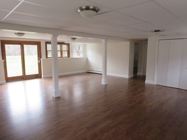 112 West Groton Road Shirley, MA 01464 - Photo 16 of 29 a view of an empty room with wooden floor and a window