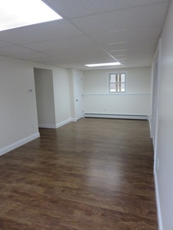 112 West Groton Road Shirley, MA 01464 - Photo 19 of 29 an empty room with wooden floor and windows