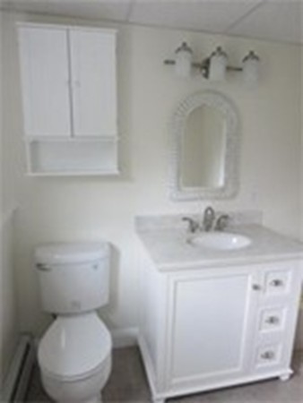 112 West Groton Road Shirley, MA 01464 - Photo 20 of 29 a white toilet sitting next to a bathroom sink