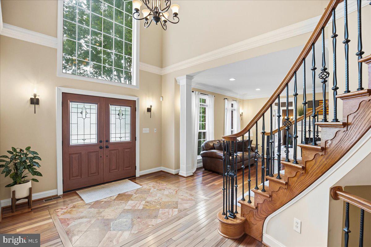 4100 Hidden Creek Road Port Republic, MD 20676 - Photo 19 of 99 Marble and hardwood entrance foyer