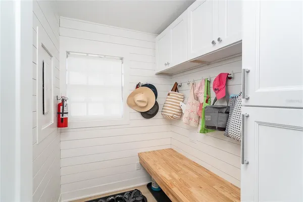 a view of storage and utility room with racks on the wall