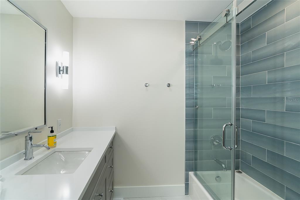 7524 Palm Island Drive South, Unit 1322 Boca Grande, FL 33921 - Photo 37 of 53 a bathroom with a sink and a tub