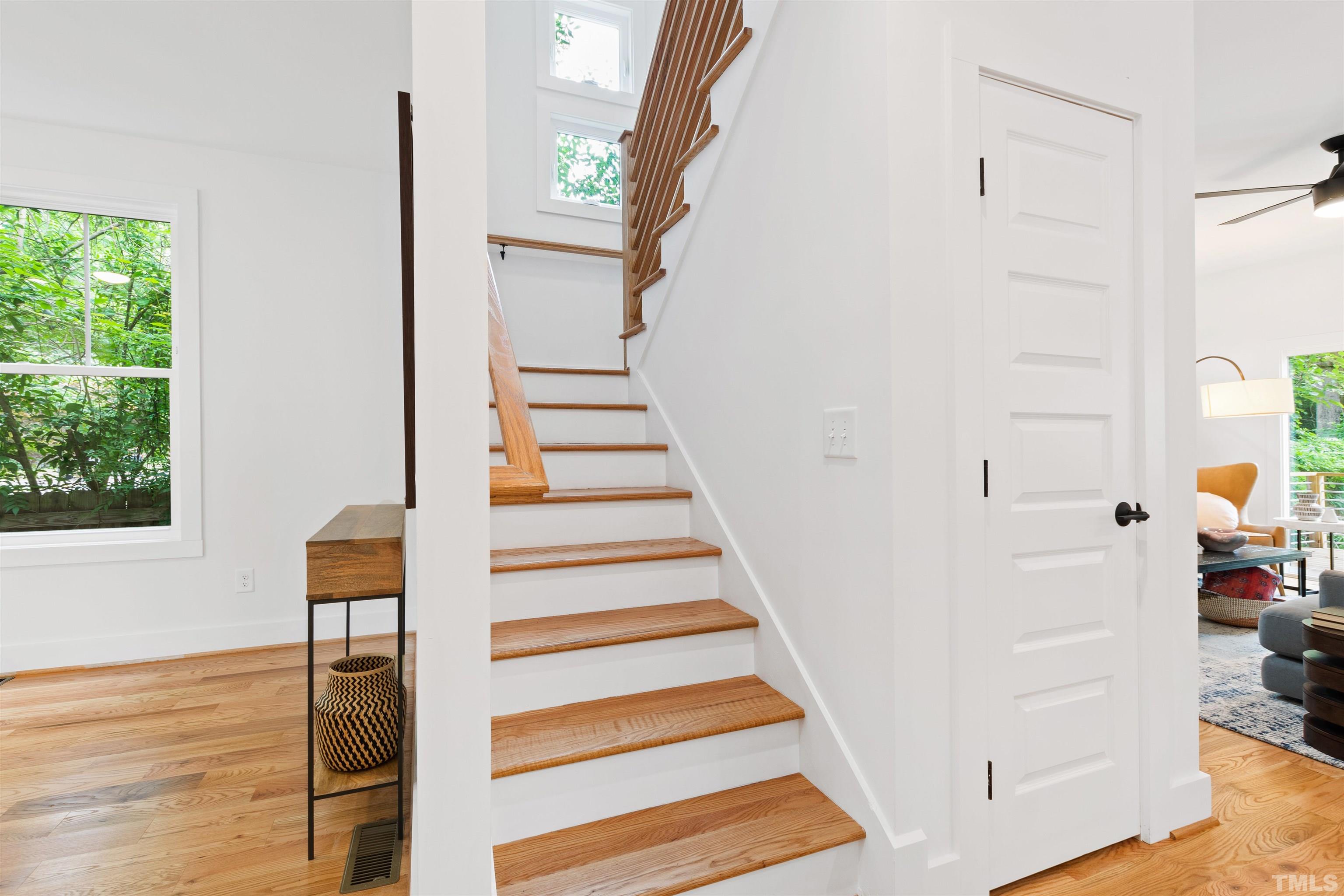 704 Colonial Street Durham, NC 27701 - Photo 22 of 42 a view of entryway and hall with wooden floor