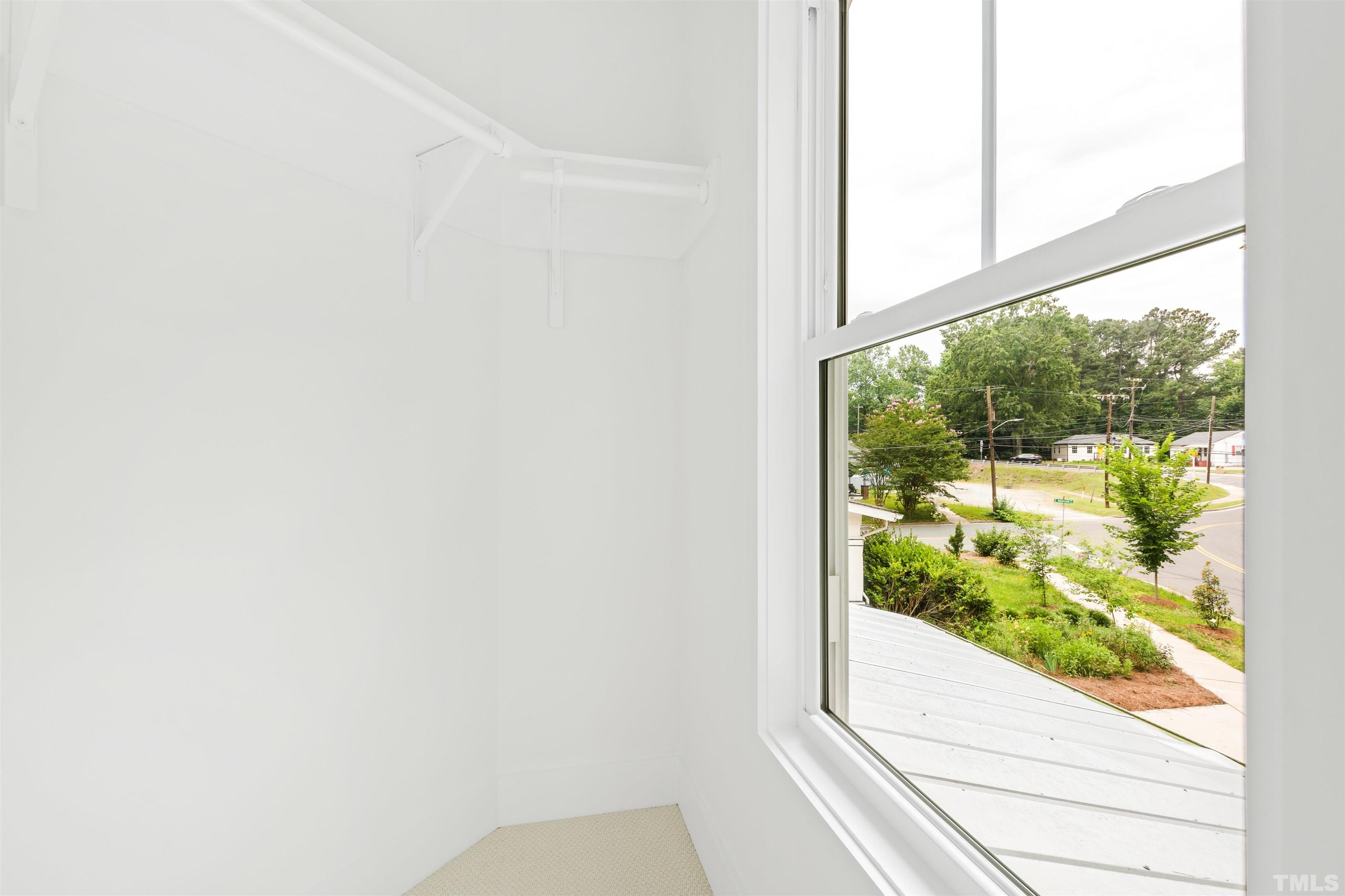 704 Colonial Street Durham, NC 27701 - Photo 34 of 42 a view of a window in an empty room