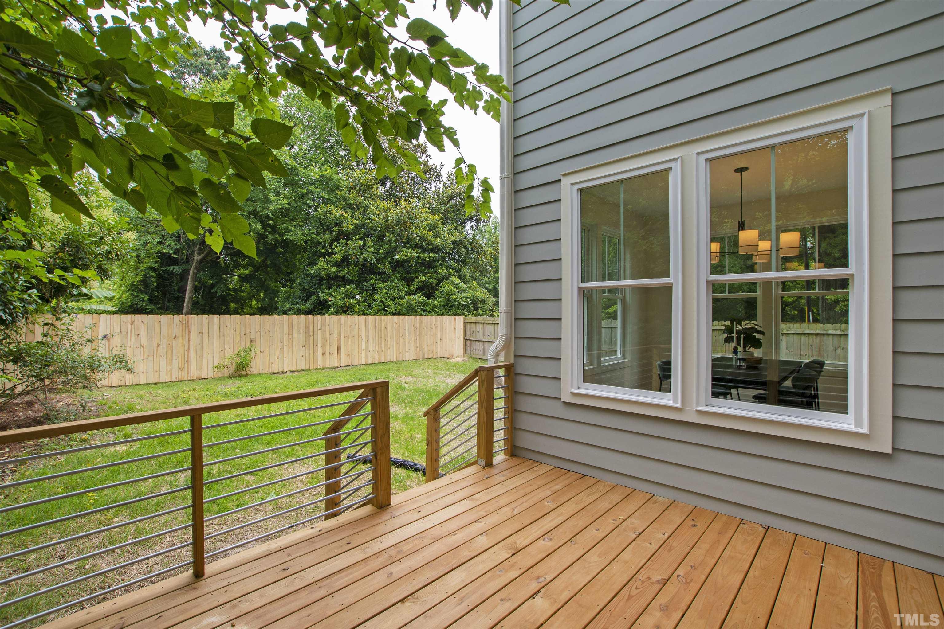 704 Colonial Street Durham, NC 27701 - Photo 38 of 42 a view of outdoor space and deck