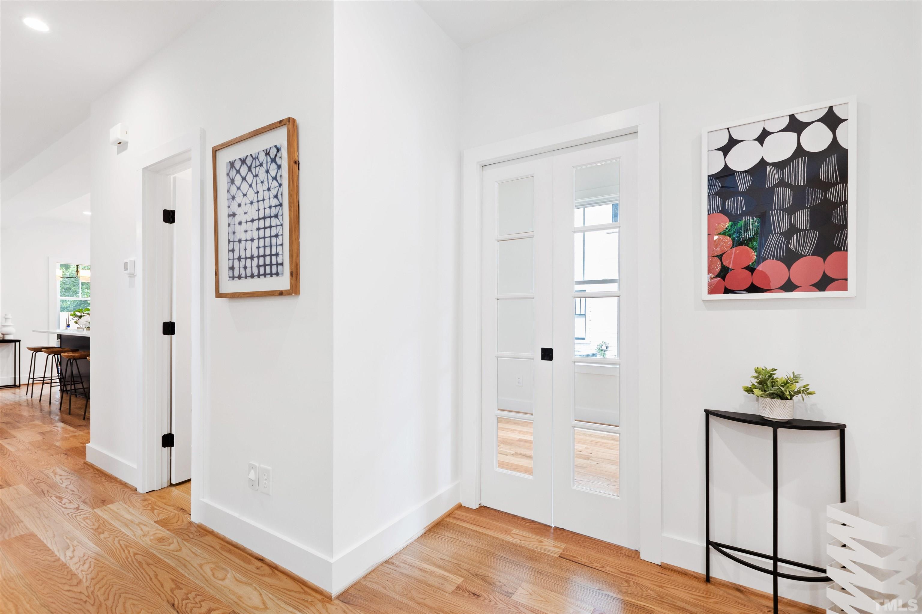 704 Colonial Street Durham, NC 27701 - Photo 7 of 42 a view of an entryway with wooden floor