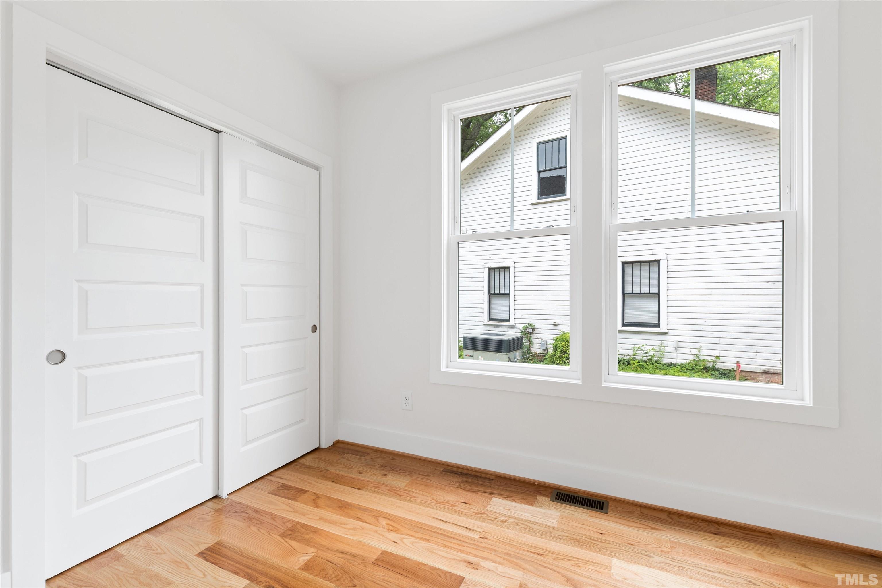 704 Colonial Street Durham, NC 27701 - Photo 8 of 42 an empty room with window