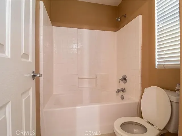 a living room with gym equipment