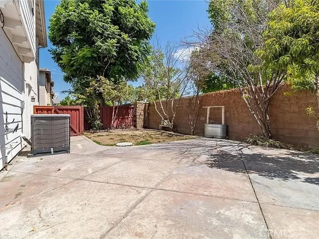 an aerial view of a house with a garden view