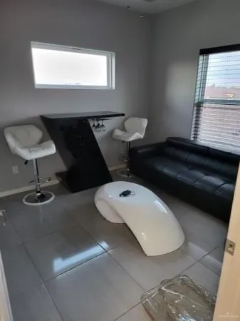 a bathroom with a toilet a sink and a mirror