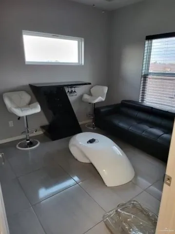a bathroom with a toilet a sink and a mirror