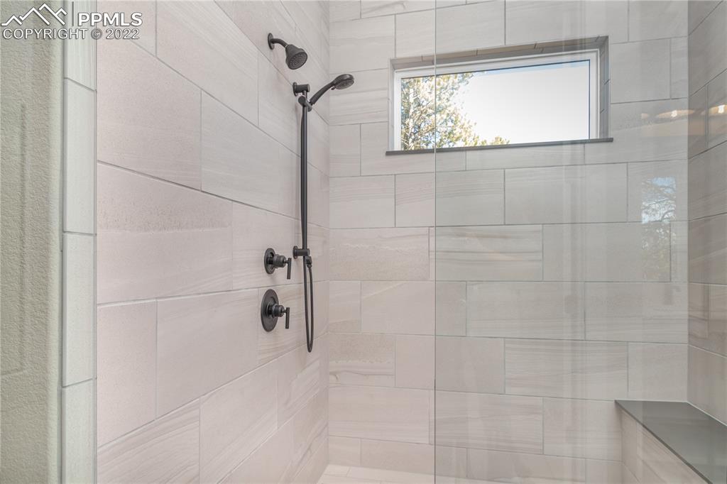 10675 Hardy Road Colorado Springs, CO 80908 - Photo 18 of 45 a bathroom with a window