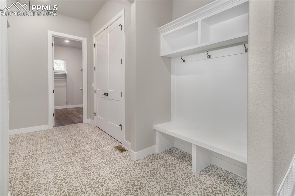 10675 Hardy Road Colorado Springs, CO 80908 - Photo 19 of 45 a view of entryway with bathroom