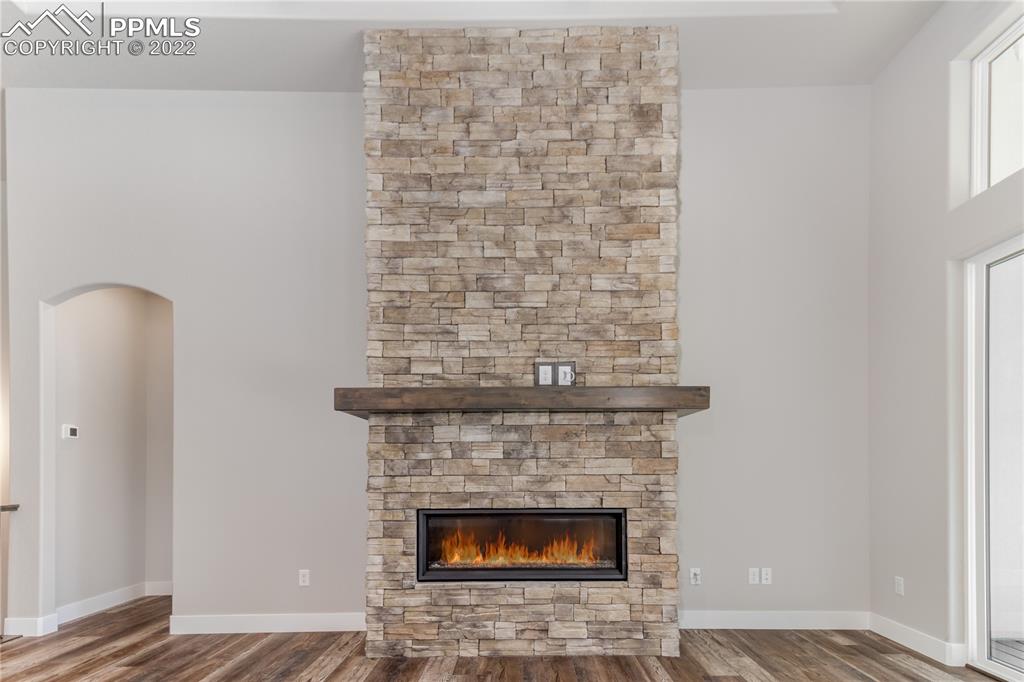 10675 Hardy Road Colorado Springs, CO 80908 - Photo 8 of 45 a room with a fireplace