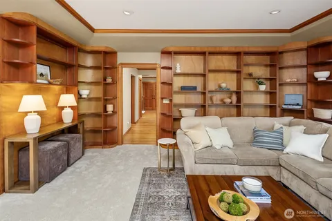 a living room with furniture and a rug