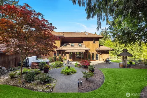 a view of a house with a garden