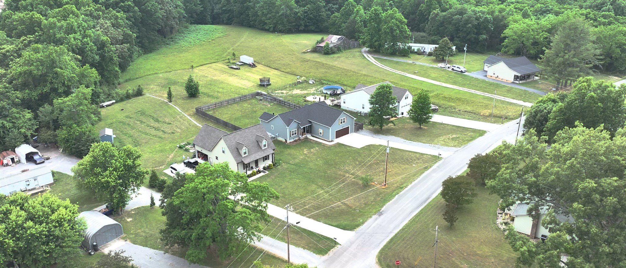 601 King Ridge Road Dowelltown, TN 37059 - Photo 47 of 49 an aerial view of a house a yard and swimming pool