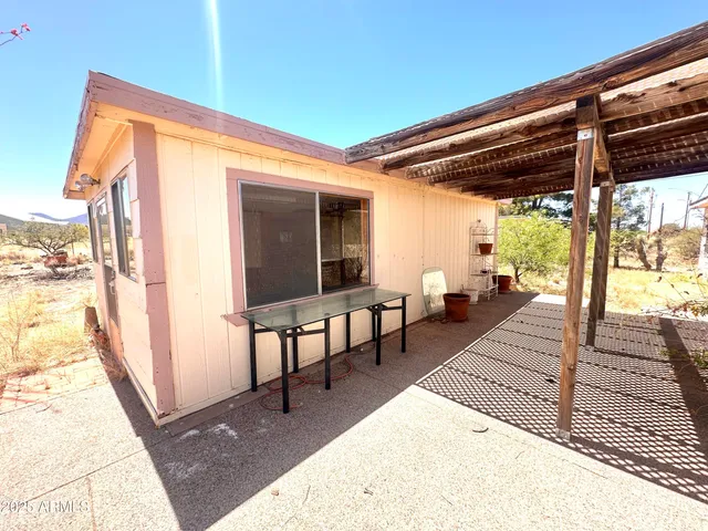 a kitchen with a sink a stove and a refrigerator