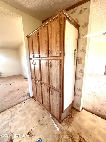a view of hallway with a large window
