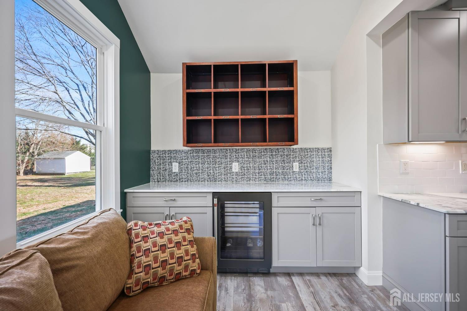 568 Village Road West Windsor, NJ 08550 - Photo 14 of 43 a kitchen with stainless steel appliances granite countertop a sink and a granite counter tops