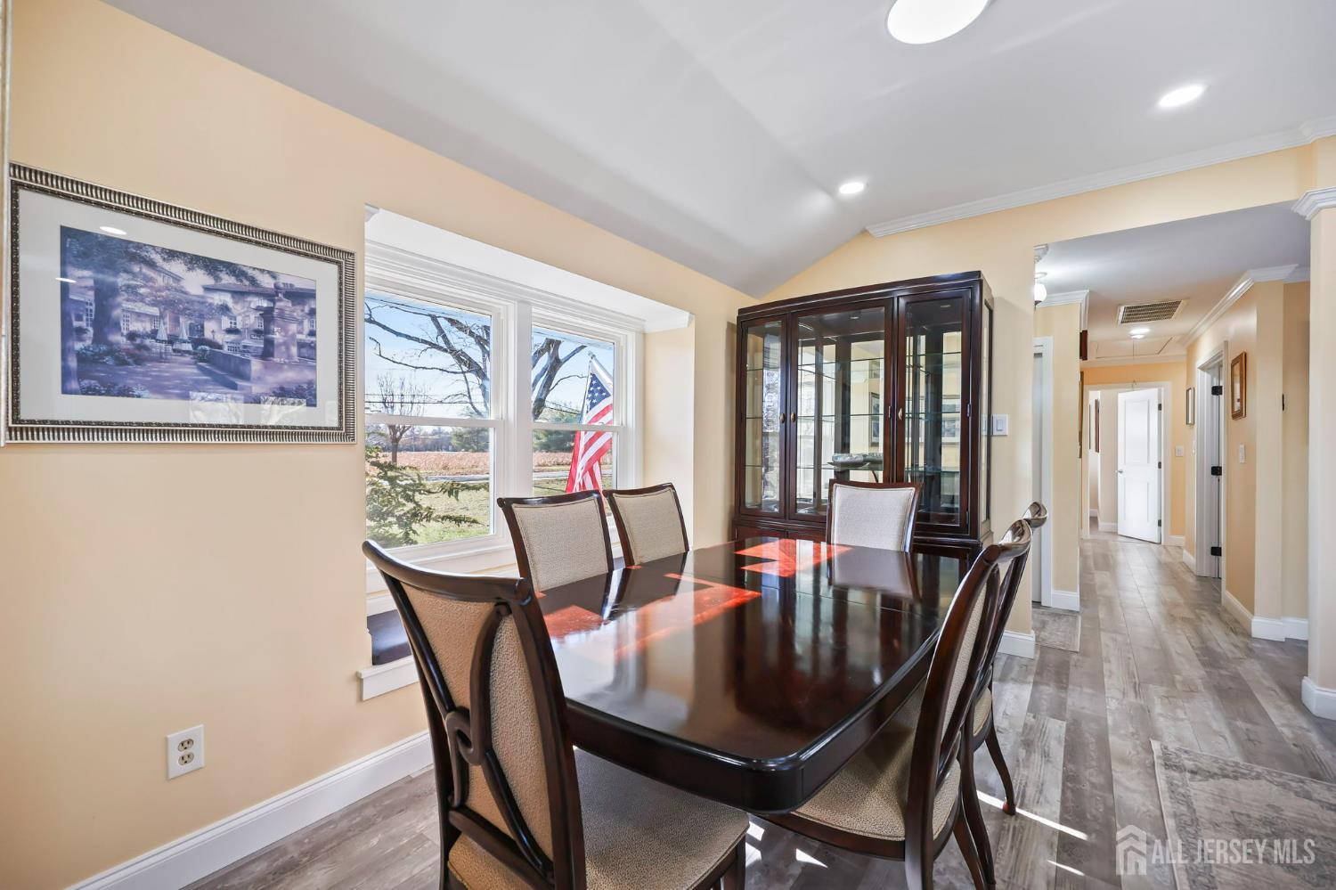568 Village Road West Windsor, NJ 08550 - Photo 17 of 43 a view of a dining room with furniture window and wooden floor