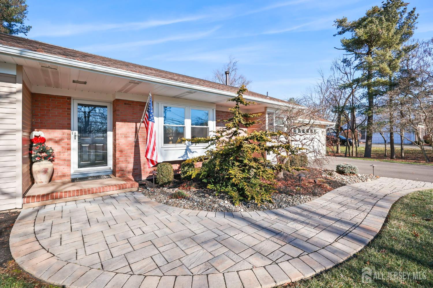 568 Village Road West Windsor, NJ 08550 - Photo 2 of 43 front view of a house with a chairs
