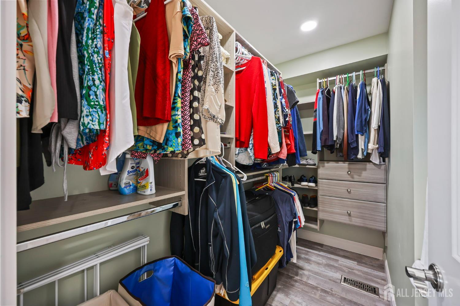 568 Village Road West Windsor, NJ 08550 - Photo 29 of 43 a view of walk in closet with clothes and shoes